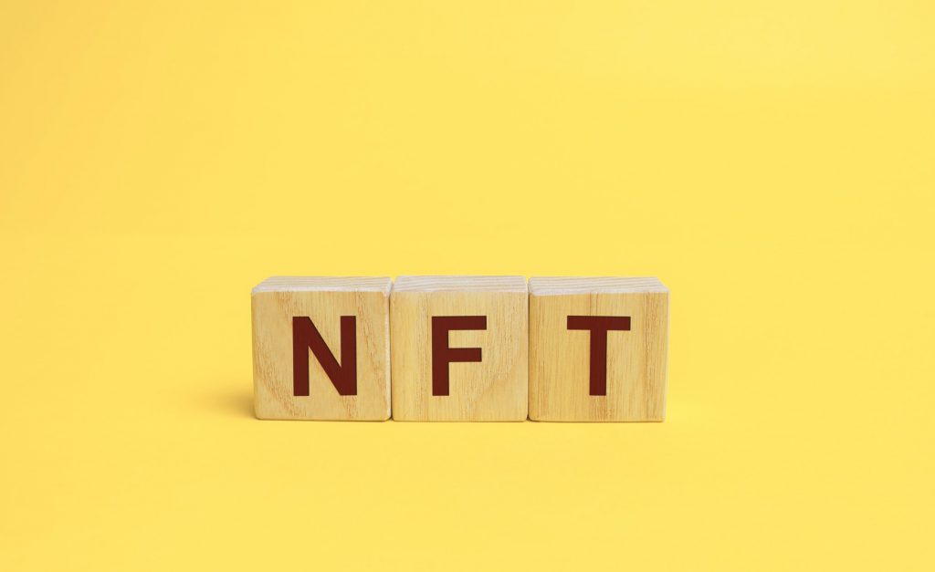 Wooden blocks NFT - non-fungible token. Digitally represented product or asset.